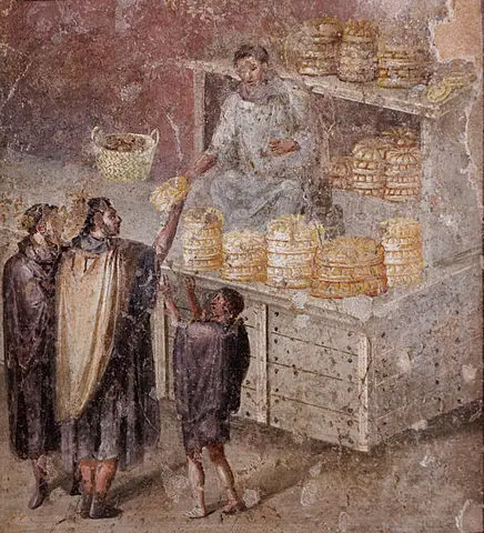 Roman statesman handing out bread to the Roman people