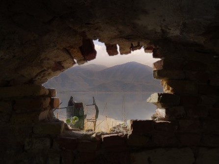 Image of a Spartan cave looking out over the mountains.